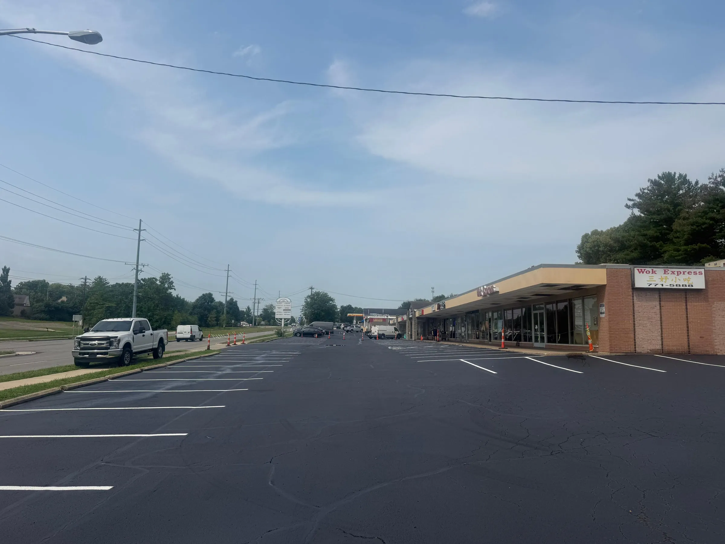 Commercial parking lot sealcoating and line striping project in Cincinnati, OH